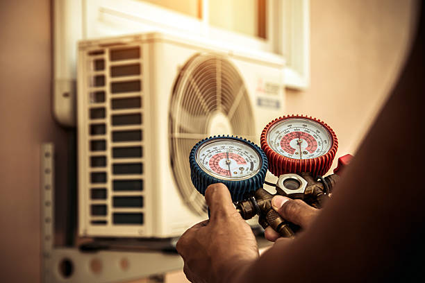 Professional Air Conditioning Service technician working in Mexico, IN